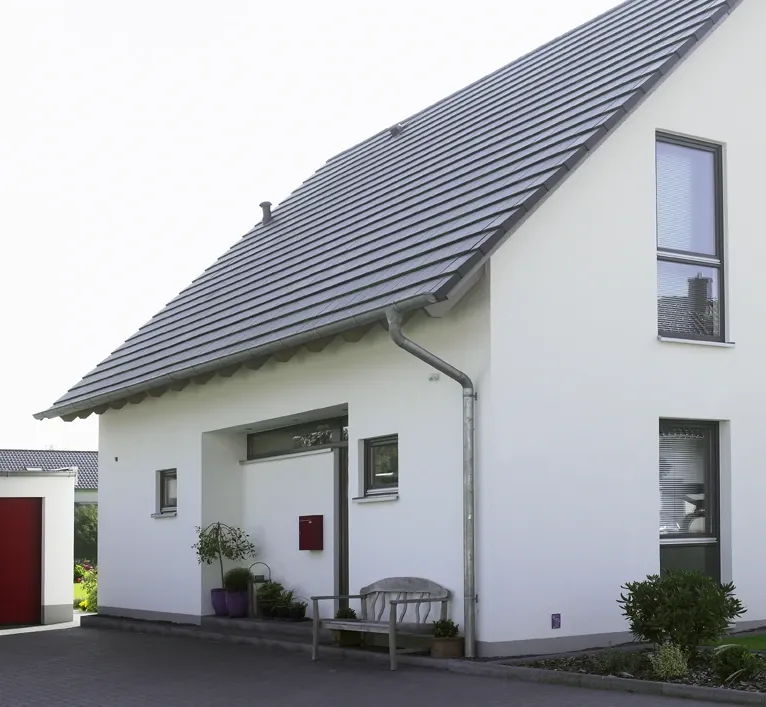 Einfamilienhaus in Stift Quernheim: Satteldachhaus mit Eingangsbereich