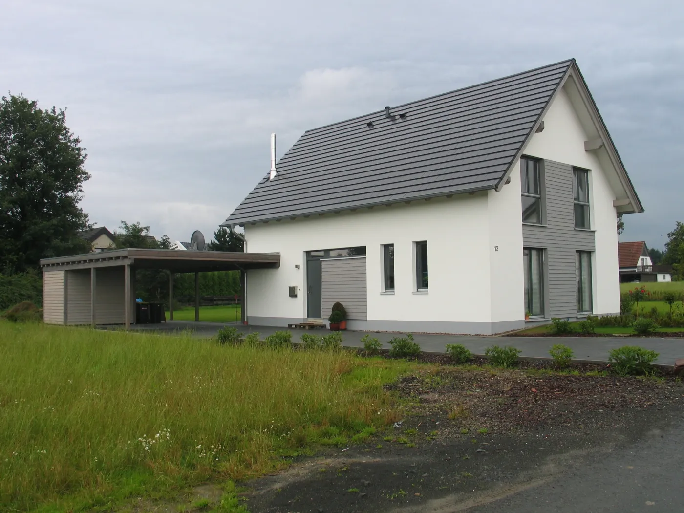 Einfamilienhaus in Stift Quernheim: Satteldachhaus mit Carport